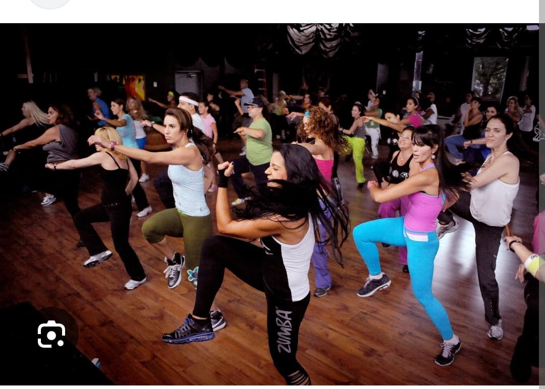 Group Zumba class with energetic participants